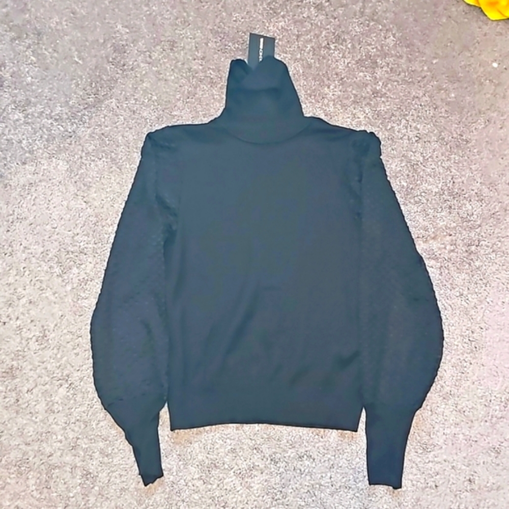 Black Turtleneck
